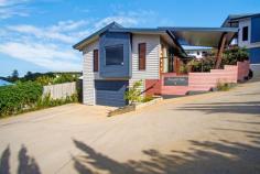  3/4 SUNNYSIDE COURT MALENY QLD 4552 $489,000 Just a ten-minute walk to the vibrant township of Maleny is this modern townhouse. Set in an elevated position, this practical and welcoming property captures the best of Maleny views and breezes. With two large bedrooms and en suite to the master bedroom, it offers comfortable, low maintenance living. Boasting a covered timber deck, it's the perfect weekender to escape with family and friends, a potential investment or the opportunity to downsize. Property Features: - Open plan living - Large windows capturing natural light - Modern kitchen with ample storage and Caesarstone benchtops - Two large bedrooms - En suite to main - Study - Remote control garage with internal access - Loads of storage space - Large sliding doors leading to covered deck - Town services - Ten minute walk to Maleny Timeless fixtures and fittings and neutral colours has been used throughout to ensure this home will remain modern and fresh for many years to come. And with all the cafe's, restaurants, shopping and amenities at your doorstep; this townhouse is a must inspect. 