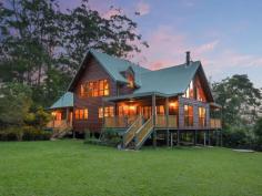  154 ENGLE ROAD REESVILLE QLD 4552 $1,300,000 ombining 34 acres of Land for Wildlife native Australian forest, walking tracks and a beautifully presented 12 year old Chalet Style home, this property meets the brief for privacy, tranquility and nature while also delighting the future buyer with a generously proportioned home. The land area on offer is noted for its significant Native Vegetation and therefore we believe the future buyer will have a keen desire to continue protecting this amazing natural resource. Enjoy the sounds from an array of birdlife and expect regular visits from the King Parrots. Your forest is also home to the Potoroo, with the site being recognised by Council as an important habitat for the preservation of this little animal. Well established walking tracks will take you on a circuit of the property and provide easy access for nature watching and general maintenance. Designed to bring the stunning environment close to the home, soaring cathedral ceilings are beautifully enhanced with window glazing to most of the north facing side of the home. On a moonlit night, you will enjoy the light filtering through the trees and in winter, the warming sun. The lower level of the home includes an entry hall, 3 bedrooms, main bathroom, laundry, well-appointed large kitchen and an open plan lounge / dining area which extends out to the front and rear verandahs. The upper level of the home provides a deluxe master suite with 2nd living area, main bedroom, walk-in robe, ensuite and verandah. Each of the rooms throughout the home are generously proportioned and with high ceilings, provide a luxurious sense of space. One of the outstanding aspects of this property is the gentle nature of the land. The parcel around the residence is near level, while the open space cow paddock and spring fed dam are all easily accessed and very user friendly. The property has an abundance of water with 45,000 litres collected from the home and a reliable bore reticulated to various parts of the property. Storage and workshop space should be ample with a double garage, double carport and a 9m x 6m shed. You may also wish to consider further development and build a few cottages. This property would offer the most outstanding eco style holiday stay if you were to obtain planning approvals for a number of cabins. This is an exciting opportunity to explore in so many ways. Secure your own outstanding slice of the Hinterland today! ** All information contained herein is gathered from sources we believe to be reliable. However, we cannot guarantee its accuracy and interested persons should rely on their own enquiries. 