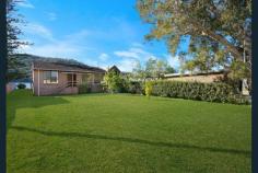  21 Taylor Street Woy Woy Bay NSW 2256 $1,500,000 - $1,650,000 This private waterfront home with captivating views of Woy Woy Bay and the Mountainous outlook of Brisbane Water National Park is located within a 35 minute drive to Hornsby. The home oozes appeal with your private jetty, slipway three bedrooms, high ceilings and a double garage with workshop and bathroom. The features include; - Private jetty & slipway - Two bedrooms the main with large built in wardrobe. The home is easily converted back to a three bedroom - The bathrooms is a two way with shower and separate bathtub - The kitchen is open planned with loads of storage space and electric appliances and is positioned to take in the stunning views of the waterways - The dining and living leads to a covered elevated entertainment space area with 180 degree bay and national park views - A second living space is positioned to overlook the large front yard - A double garage is oversized with automatic door, generous work shop space and bathroom - The block is approximately 980 square metres Don't delay to inspect, call John Carey on 0417 683 925 to arrange a private viewing. To view more properties go to randwuminabeach.com.au Disclaimer: Richardson & Wrench Umina Beach have obtained all information herein from sources we believe to be reliable; however, we cannot guarantee its accuracy. Prospective purchasers are advised to carry out their own investigations.. 