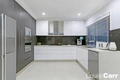  12 Atlantic Place Beaumont Hills NSW 2155 Idyllically positioned in a quiet enclave of Beaumont Hills is this spectacular oasis, a versatile family home of substance and style. The impeccably renovated residence displays a perfect combination of fluid open living and luxury outdoor entertaining. Nestled in a family friendly location just moments from schools, shopping precincts and transport facilities. This stunning dual level residence has been completely renovated and offers an unparalleled level of quality and lifestyle. Property features: • Spacious formal lounge room features high ceilings and decorative cornices • Expansive casual living room seamlessly extends to alfresco entertaining area • Beautifully renovated kitchen enjoys gas cooking, quality stainless steel appliances, Caesar stone bench tops, glass splashbacks and an abundance of storage facilities • Sun drenched open plan casual dining area and family room features a stunning bar with marble tops and waterfall edging • King size master suite consists of a huge walk in robe and beautifully renovated ensuite with double vanity and floor to ceiling travertine tiles • Remaining 3 well proportioned bedrooms all with built in robes plus tastefully renovated ensuite to the 4th bedroom • Generous upstairs rumpus room offers a tranquil sanctuary • Stunning renovated main bathroom with freestanding tub, floor to ceiling tiling plus separate toilet • Downstairs powder room is located on the main living level for your convenience • An exceptional alfresco zone complete with outdoor kitchen, BBQ, ceiling fans, downlights and all weather, fully automated café blinds creates a private haven year round entertaining • Good size automatic double car garage plus ample off street parking • Low maintenance 598m2 block with level child friendly rear yard and easy care gardens • Some additional features include high ceilings, ducted reverse cycle air conditioning, ducted vacuum, security system and much more Location Benefits: • An easy 1km walk to Beaumont Hills Public school and zoned for Rouse Hill High school • Only a 800m stroll to Beaumont Hills shopping village including Supa IGA supermarket • Rouse Hill Town Centre is within a short 3km drive plus the new North Kellyville shopping village only a 2.9km drive • Metro train stations are located at Rouse Hill and Kellyville - 3.6kms away • Local bus services on The Parkway are within an easy 350m stroll *Every precaution has been taken to establish accuracy of this information, but does not constitute any representation by the vendor, agent or artist. FEATURES  Air Conditioning  Built-In Wardrobes  Close to Transport  Close to Shops  Vacuum System  Close to Schools  Ensuite… 