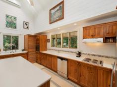  43A Mary Cairncross Avenue Maleny QLD 4552 $650,000 On a user friendly 2336m2 block bordering Mary Cairncross Rainforest Reserve, on the sought after east side of Maleny township, this appealing home has much to offer. Tucked away down a tree lined driveway you'll be impressed by the many features, including: * Hardwood timber 2 bedroom, 2 bathroom home with timber country style kitchen, reverse cycle air conditioning and cottage style throughout * Lock up garage(6mx9m) plus single lock up garage attached to the home * A bore for the established gardens and fruit trees * Picture book dam with wooden bridge to your own little island! * Reduced electricity bills with a 3kw solar system in addition to mains power * Walking distance to Mary Cairncross Park and Café plus local restaurants The chalet style home flows well with dining, kitchen, main bedroom and ensuite downstairs and another spacious bedroom with ensuite and lounge room upstairs. Large covered verandahs to the North East take in the impressive but low maintenance gardens. The established trees and shrubs ensure a feeling of privacy and seclusion with plenty of open spaces. The current owner had planned to retire here however plans have changed and you will benefit from their attention to detail and the many extras. Inspection is a must to truly appreciate all this property offers and make sure you don't hesitate because at this price it won't be around long! All information contained herein is gathered from sources we believe to be reliable. However, we cannot guarantee its accuracy and interested persons should rely on their own enquiries.. 