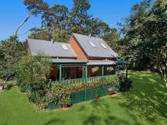  43A Mary Cairncross Avenue Maleny QLD 4552 $650,000 On a user friendly 2336m2 block bordering Mary Cairncross Rainforest Reserve, on the sought after east side of Maleny township, this appealing home has much to offer. Tucked away down a tree lined driveway you'll be impressed by the many features, including: * Hardwood timber 2 bedroom, 2 bathroom home with timber country style kitchen, reverse cycle air conditioning and cottage style throughout * Lock up garage(6mx9m) plus single lock up garage attached to the home * A bore for the established gardens and fruit trees * Picture book dam with wooden bridge to your own little island! * Reduced electricity bills with a 3kw solar system in addition to mains power * Walking distance to Mary Cairncross Park and Café plus local restaurants The chalet style home flows well with dining, kitchen, main bedroom and ensuite downstairs and another spacious bedroom with ensuite and lounge room upstairs. Large covered verandahs to the North East take in the impressive but low maintenance gardens. The established trees and shrubs ensure a feeling of privacy and seclusion with plenty of open spaces. The current owner had planned to retire here however plans have changed and you will benefit from their attention to detail and the many extras. Inspection is a must to truly appreciate all this property offers and make sure you don't hesitate because at this price it won't be around long! All information contained herein is gathered from sources we believe to be reliable. However, we cannot guarantee its accuracy and interested persons should rely on their own enquiries.. 