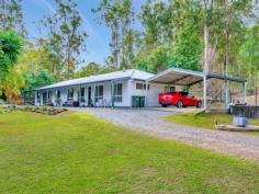  42-48 Noonara Drive Wonglepong QLD 4275 $750,000 This gorgeous property feels so much bigger than the 2.6 acres (approx) it sits on. The home is tucked away from the quiet road with a paddock along the roadside and plenty of foliage around the home and the paddock. It boasts 4 generous bedrooms all with built-ins, 2 separate living areas, perfect for a parents retreat or study area. The current owners have given this home a real spruce up, with new paint inside and out and adding a solar system. A combined kitchen, lounge and dining gives a huge space for family sharing and entertaining. It is also has a handy separate toilet for guests, or for a larger family. Outside the master suite is a sitting room/study/parents retreat. This room has access to the verandah which runs across the front of the house. The front of the home overlooks the oasis, a beautiful pool and a good sized entertaining area surrounded by tropical plants. A perfect spot to unwind on weekends or after work in all seasons. The back of the home has a fenced yard for the dogs and offers you privacy from the neighbours as there are plenty of trees. Beyond the back fence is just natural bush, and offers that sense of living away from the rest of the suburb. The property is neat and tidy and has 2 stables, a bore and sturdy fencing. The 2 car garage has a huge workshop beside- a great spot to tinker or to hold any extra toys or equipment you may own. As this shed is set away from the house these owners have constructed a double carport beside the house for convenient undercover parking. There is also a single carport beside the garage for additional parking or for storing equipment with ready access. This is a lovely property with a wonderful feel to it. It would suit almost any family configuration. I look forward to offering you an inspection. 