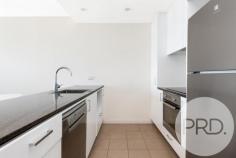  39 Benjamin Way BELCONNEN ACT 2617 $429,000+ Ready for move in! This spacious 2-bedroom apartment is located in the highly sought-after complex of "Sentinel", superbly positioned near the centre of buzzing Belconnen. Belconnen Westfield is just steps across the street. Enjoy walking distance to Westfield, waterfront restaurants and various Government departments. Perched on the 15th level, with floor-to-ceiling double-glaze windows, this apartment offers an unrivalled view of Canberra's iconic Telstra Tower. The spacious living area can easily fit a dining table, couch, lounge chairs and a coffee table. The generous-sized main bedroom with built -in Robe can easily fit a king-size bed. The Balcony offers great views and seamless access to the indoor living/dining area and the main bedroom is filled with natural light. The open plan Kitchen is equipped with stone bench tops, stainless steel appliances, dishwasher and plenty of storage and pantry space. As an adaptable floor plan, the bathroom is huge and has a lot potential. The building offers a luxury resort lifestyle for residents with beautiful sky garden, sports gym and swimming pool. This is a rare and perfect opportunity for downsizers, first home buyers and investors. Ready for move in now! Features: • 77 m2 living + 8 m2 balcony • Floor-to-ceiling Double-glaze windows • Unrivalled view of the Iconic Telstra Tower • Spacious Living Area • Easy-to-maintain Floor Board in living and kitchen • Open plan kitchen with stainless steel appliances, dishwasher, stone bench tops and ample cupboard and pantry storage space • Adaptable floor plan with a lot potential • R/C air-conditioning system • Access to Resort-style Sky-Garden , Gym and Swimming Pool • Huge Bathroom • Bathroom with floor to ceiling tiling • Security parking space with storage cage • European-style laundry including dryer • In close proximity to Hospitals, Westfield Belconnen, Restaurants, bus interchange, CISAC Pool, Government offices and the University of Canberra. • Public transport just outside the complex Particulars (all approx.) Living Size: 77 m2 Balcony Size: 8 m2 Year Built: 2014 Rent Estimate: $480/week Strata: $1182 per quarter Rates: $353 per quarter EER: 6.0.. 