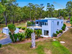  103-109 Bluegum Drive Wonglepong QLD 4275 $738,000 This beautifully designed home makes the most of the 2.97acre corner block. With 2 street access it gives the owner many options for their use of the land and facilities. Because the home has 2 levels, the lower floor is ideally suited for your guests, extended family, teenagers or in-law separate living. Bright and airy the lower floor has 2 bedrooms a kitchen and separate bathroom, the large downstairs lounge area opens onto a covered entertaining area. If you need more space there is an additional room suited for a variety of uses like a media room, home office or craft room, the option is yours. The internal, polished timber stairwell gives a sense of 2 complete apartments that are still connected. The top floor has 2 more bedrooms, a large living area that opens out onto the big deck overlooking the property and backdrop of Mt Tamborine, living space is open plan to the kitchen and dining areas. There is a full 2 way bathroom on the top level also. Throughout the home are ceiling fans and zoned ducted air conditioning. The upstairs bathroom has a chute connected to downstairs where a front loading washing machine awaits that is included in the sale. Added to all the benefits of the living space the construction of the home is steel frame, concrete block rendered and blue board rendered with colour bond roof that is insulated, and you will be buying a comfortable home with peace of mind. The property boasts several sheds for your convenience including a large 3 car garage that has a drive through option having a roller door at the back of the shed for 1 bay, remote controls to all 3 doors, three phase power, 2 ceiling fans, loads of separate work space and storage area. There’s also work bench tops, cupboards and kitchen sink with water for the best his/hers cave, especially when they want to getaway from the house. It even has NBN internet connection & lots of power points. In front of this garage is a 3car space carport/awning with plenty of light and power outlets for convenience and it’s high enough to store your small caravan or camper trailer with boat on top. The second shed is a single garage that’s currently being used to store the ride on’s , garden equipment and mini tractor plus it also has bench space, sink with running water, washing machine and remote control roller door. Three phase power is also connected with ample power points for the tools. The property has tank capacity for 64,000 ltrs, NBN 100 to the home, timber post and rail fencing to the road boundaries, and the property is fully fenced. There is also a large colorbond shed with concrete floor that is ideal for storage / tradesman or tack room to house the horse gear, an additional carport is next to the shed for storing trailers or used as shade for a pet horse. The owner has also installed boundary lighting to light up some of the paddocks. This is truly a unique property with so many features. We are conducting single inspections by appointment during the COVID-19 restrictions. Please contact the agent to discuss your interest in this property. 