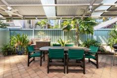  4/20 STOKES STREET PARAP NT 0820 $340,000 The tiled open plan air conditioned living/dining area opens onto a large private undercover entertainment area framed by an established garden. This spacious 10m x 3 m ( approx.) verandah with modern ceiling fans is a great place to relax and will make entertaining a breeze all year round. The good sized kitchen is well maintained and provides plenty of storage, microwave nook, gas hotplates and large fridge recess. There are two tiled spacious bedrooms both with built in robes and split system air conditioners. The master bedroom with French doors has direct access to the rear garden. The bathroom is centrally located and has floor to ceiling tiles, modern seamless shower screen and vanity unit. Outside, along with the great entertainment area, is a paved side yard and garden shed with still enough room for a pool. Some of the many features of this property include a slimline rainwater tank, solar panels and solar hot water and so saving on your power bills. The electrical system throughout the unit has been upgraded to enable the home to be run off a generator in case of major power failures. An additional storage locker is located within the carport and there is parking for a second vehicle under the shade sail. This home, only minutes from the city is located in a quiet area. It is within easy walking distance of the Parap shopping centre and markets, public transport and the local primary school. Body corp - $899 per quarter Council rates - $1,500 (approx) per annum.. 