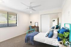  12 Acacia Avenue GOONELLABAH NSW 2480  $589,000 Stepping through the modern double doors to a wide entry with a lovely tiled feature wall, you will see the central kitchen with outdoor servery, breakfast bar and living/dining area that also opens to the outdoor area. Around to the right of the kitchen is the big second living area with bamboo flooring, air conditioning and bay style front window placements. This living room also opens to the outdoor area which completes a perfect design for entertaining. Moving to the hallway off the living/dining takes you to the bedrooms and the internal door to the DLUG, which is nice and close for unloading the shopping and bringing it to the kitchen. The bedrooms are all much larger than standard with built ins, carpet and ceiling fans. The central bathroom is massive and boasts a big corner spa, shower and double vanity. There's a separate toilet next to the bathroom. You will see tonnes of storage cupboards in the laundry. The huge master bedroom has its own ensuite with shower, toilet, vanity and separate walk in robe. Sitting on a 700m2 block the yard is very easy care with landscaped gardens, colourbond fencing and a small garden shed out the back. The outdoor entertaining area with insulated ceiling panels can be enclosed with its summer screens to keep nice and cool in summer or enjoy a cuppa in the warm winter sun. There's 3kw of solar panels, solar hot water, security screens on all doors, and tinted windows to keep you cool in the hot summer. Whether you are upsizing or downsizing, you must inspect this big beautiful home now and start enjoying an easy low maintenance life. Only minutes from the Goonellabah Shopping Centre, and close to schools, health services and all the amenties you may need. 