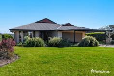  41 The Ridgeway Cumbalum NSW 2478 $760,000 - $820,000 Located in an elevated position this contemporary family home offers wide ranging hinterland views which can be particularly enjoyed from the large timber deck that would be the perfect place to entertain guests. The home is in great order with lovely polished timber floorboards in the living areas complimented by high ceilings with an abundance of natural light and cross ventilation. There is the bonus of a big storage area under the house which is ideal for a gym or perhaps the ultimate man cave'. Family friendly location with new sporting fields nearby and a safe cycleway through to Ballina. • 4 good size bedrooms plus an office • Covered garaging for 4 vehicles with a double garage plus carport • Only a 10 minute drive to Ballina or 15 minutes to Lennox Head • Great size block of 929m2 with room for a pool.. 