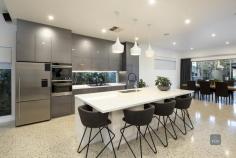 11 Milner Street Prospect SA 5082 $2,000,000 - $2,200,000 Set over 2 levels and proudly standing on over 1400sqm here is a truly unique opportunity to purchase in one of Prospect's most tightly held tree-lined streets. This substantial home offers an excellent mix of traditional warmth and charm with quality modern refurbishment for today's living and entertaining enjoyment. - Fully renovated and extended in 2016 - Retaining superb original features, ornate domed ceilings, feature leadlight windows, glazed brick fireplaces and polished Jarrah timber floors - Multiple living and entertaining areas both inside and out 5 generously accommodating bedrooms both downstairs and upstairs, 3 with their own en-suite bathrooms - Main bedroom suite features luxurious en-suite and free standing feature bath, gas log fireplace and double floor to ceiling robes in luxe open dressing room - Huge light filled family living, dining and kitchen features polished concrete floors and floor heating, seamless 2-pac cabinetry, Caesarstone benchtops, plus separate butler's pantry - Glass-wall wine room with built in cabinetry - Extensive year round outdoor entertaining patio with café blinds, gas heating, brick Pizza oven, and outdoor kitchen with teppanyaki cooktop. Solar heated Aqua Mineral in-ground swimming pool, fully glass fenced - Hideaway solar blanket - Decked pavilion overlooking the pool with dedicated storage - Ducted evaporative cooling, gas ducted heating, r/c split system air conditioning, underfloor heating, gas fireplace - Easily maintained and pristinely presented established gardens with auto watering system, the front garden with feature water fountain - 9kw solar system - Security intercom, automatic gates with double entry driveway - Data cabling - 15,000L rainwater tank plumbed to house - Double carport with remote control roller door to double garage plus incorporates a large workshop or utilise the area as a home gym. - Additional off street parking Situated in this ideal location where the cosmopolitan lifestyle awaits. Walk to the park-lands and North Adelaide. Easy access to sought after private and public schools. All information provided (including but not limited to the property's land size, floor plan and floor size, building age and general property description) has been obtained from sources deemed reliable, however, we cannot guarantee the information is accurate and we accept no liability for any errors or oversights Specifications • 	 5 Beds • 	 4 Baths • 	 5 Car Spaces • 	 Land area is 1430sqm.. 