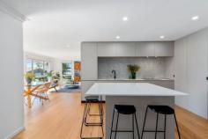  106 Skyline Terrace BURLEIGH HEADS QLD 4220 $995,000 This well presented family home has been stylishly renovated to today's modern standard while still managing to capture a timeless elegance. The elevated, north facing home has a desirable sunny aspect offering a light and bright ambience, flow through cross ventilation and ocean glimpses. The main living areas, kitchens and bedrooms are upstairs while the separate downstairs areas would be ideal for a dual living scenario or teenage retreat. • Centrally located, modern gourmet kitchen with stone tops; • Three separate, spacious internal living areas; • Two large covered alfresco decks with views; • Quality bathrooms featuring herringbone marble tiles and designer cabinetry; • Timber flooring, new carpet, high ceilings; • Large 1054m2 block offering privacy and tranquility, double lockup garage. The home is in a much sought after area on the ridge overlooking Burleigh Heads with easy access to the beach, Tallebudgera estuary, major shopping centres, restaurants, cafes and quality schools. 
