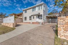  113 Government Road NELSON BAY NSW 2315 Positioned in one of Port Stephens most highly desired pockets, lies this beautiful family entertainer just mintues to Bagnalls Beach, Dutchies Beach and only a short stroll to the CBD and Marina. This home offering the chance to secure a once in a lifetime opportunity. This generous family home is immaculately presented and blends character and contemporary finishes in an idyllic natural setting for family living. Graced with a sublime sense of light from its northern aspect, the versatile floor plan will easily accommodate a growing or established family. A vast selection of formal and informal entertaining areas, and large light filled interiors are sure to create easy care living from young to old. Emphasising true coastal luxe interiors, the seamless blend of neutral walls transitions down to oak timber floorboards to deliver exceptional spaces throughout the property. Upstairs, the home captures the core of coastal living, with beautiful blue ocean views formed from Bagnalls Beach. Comfortably appointed with ceiling fans and 2 x split system air conditioning allowing you to be in control of the temperatures all year round. There are three bedrooms of accommodation plus large study or optional second living area, alongside two spacious bathrooms. There is an amazing outdoor alfresco entertaining area, beautiful established gardens and manicured lawns which allows tranquility, privacy, and the perfect opportunity to entertain friends and family. This home just keeps getting better as there is also room to park up to 6 cars including a double carport or parking a boat or caravan. Please contact Dane Queenan on 0412 351 819 or Meg Dean on 0499 912 311 for more information on this stunning property. Whilst all care has been taken preparing this advertisement and the information contained herein has been obtained from sources we believe to be reliable, PRDnationwide does not warrant, represent or guarantee the accuracy, adequacy, or completeness of the information. PRDnationwide accepts no liability for any loss or damage (whether caused by negligence or not) resulting from reliance on this information, and potential purchasers should make their own investigations before purchasing. 