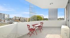  301/11-13 HERCULES STREET ASHFIELD NSW 2131 This contemporary and stylish apartment promises convenience, easy-care comfort and practicality in abundance. The open plan living and dining is bathed in natural light and flows onto a private balcony with stunning district views. Other highlights include built-in wardrobes, balcony access from both bedrooms, modern kitchen with Caesar stone benchtop, gas cooking and European quality appliances (including dishwasher), modern bathrooms, internal laundry and air conditioning. This apartment is complete with security basement parking, a storage cage and lift access. Entertainers balcony and communal rooftop entertainers terrace with stunning city views. Situated just steps away from local village shops, supermarkets, schools, as well as Ashfield station and city buses connecting to the Sydney CBD and other surrounding areas. FEATURES  Air Conditioning  Area Views  Built-In Wardrobes  Close to Transport  Ensuite.. 