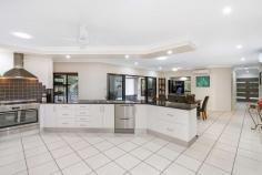  66 Dempsey Street Gordonvale QLD 4865 $895,000  This beautifully presented family property has everything that's required to make that easy transition into acreage living... The stunning home offers an enviable choice of living, dining and entertaining areas which flow seamlessly out to a vast covered alfresco entertaining area that overlooks a sparkling in-ground pool with kids slide. Centrally located, the chef's kitchen is complete with granite bench tops and an abundance of storage, ensuring preparing family meals or entertaining on a grand scale is done with ease and elegance. - Walk In Pantry / Gas Cooking - Two Drawer Dishwasher - Split System Air Conditioning - Solar Power ( 5kw )& Solar Hot water ( 46 Panels in Total ). The master bedroom provides comfort in size, there is a walk in robe and spacious ensuite with his & her vanity's and showers. The remaining three bedrooms have builtins, split air conditioning and the complete home is fully tiled. The shed measures in at 17m x 9m in size, there is power and water connected and four extra high roller doors. ( Space for your large boat and caravan ). At the front of the shed there is an added granny flat with bathroom, separate toilet and split system air conditioning. ( ideal for the older child or family friend that comes to stay ). There is also a doubled sized garden shed for storage of mowing / gardening equipment. This property is fully fenced with two street access, automatic entry gates, established gardens & privacy hedging. Gordonvale is 25 minutes drive South of Cairns CBD, there is shops, schools, doctors, sporting facilities, hotels and much much more. - 35 Minute Drive To Cairns Domestic & International Airport For More Information or Your Private Inspection Phone Brian Bolton 0n 0402 440 098 FEATURES: • 	 Air Conditioning • 	 Built-In Wardrobes • 	 Close To Schools • 	 Close To Shops • 	 Close To Transport • 	 Garden.. 