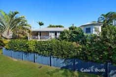  1 John Street Redcliffe Qld 4020 $645,000 Proudly residing atop a prominent corner allotment with south easterly sea views out to the bay this charming Queenslander epitomizes beauty in construction. Everything you expect from a character home is here including enjoying the warm sunrise or cool afternoon light from your wide timber entrance verandah. Come through the welcoming leadlight door and enter into a wide, high 3.2 metre ceiling open plan living and dining area with many french door openings with feature transom windows to the verandah for outside entertaining.  More leadlight features and coloured glass panels, internal timber fretwork, wide timber floorboards and surrounding VJ walls with chair rails all add to the classic style. There is room for a long dining table perfect for Christmas or family and friend get togethers which is complimented by the modernized timber kitchen with plenty of storage options, updated appliances and black Caesarstone bench tops. The three built- in queen size bedrooms are serviced by the updated large family bathroom with separate shower and bath featuring a skylight which will brighten your morning routine.  A second WC for your convenience is situated near the bedroom wing. There is reverse cycle air-conditioning in the living area and main bedroom plus ceiling fans to keep you cool in summer. A bonus separate study has its own independent access from the verandah – options aplenty! High timber fencing and established hedges provide privacy and surround the home plus there is driveway access to an enclosed extra height (2.7m) carport. There are still areas for you to add your own touches or improvements as there is room for further renovations downstairs under the new recent extension. Conveniently located less than 800m to the Margate shopping precinct, Sutton’s beach and cafés… everything including bus services and high school are also nearby. For the investor there is an established respectful tenant residing and inspections can be arranged by appointment. RARE FIND & STUNNING OPPORTUNITY IN POPULAR LOCATION... 