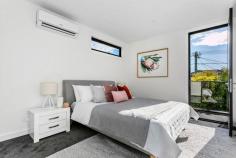  1/29D Newcastle Street Yarraville VIC 3013 $1,050,000 to $1,150,000 A newly built, sleek three bedroom home situated a stone’s throw from Yarraville Village. This architecturally designed home boasts a practical floor plan, high end inclusions and a large open plan living space, delivering the ultimate lifestyle. Beautiful timber floors greet you upon entry and seamlessly guide you past the downstairs double bedroom equipped with bathroom and continues down a central corridor to the light-filled, open plan living area. The grand, contemporary kitchen has endless cabinetry and subway tiles crown the stainless steel, 900mm appliances that are wrapped in Caesar stone. The gourmet kitchen makes entertaining easy with endless bench space for preparing and an island ideal for serving. Double stacker, glass doors seamlessly continuing the entertaining space out to the private back yard. This functional home showcases another 2 large bedrooms on the upper level with the Master enjoying a walk in robe,spacious ensuite and north-facing balcony. The third bedroom is serviced by a central bathroom showcasing floor-to-ceiling tiles, frameless shower screen, black tapware and stone tops. A dedicated upstairs retreat can easily be used as a second living area and also facilitate a functional work space. This central address allows you to walk to school and parks and is only 500m to all the Villages extensive dining, cafes, bars, Sun Theatre and great shopping. Yarraville train station, Francis St buses, bike paths and 9km to Melbourne’s CBD puts you in a perfect location. Set yourself up for the future in this flexible, low-maintenance home. Additional features include- -floating staircase -separate laundry -double kitchen sink -canopy rangehood -SS dishwasher -matt black tapware and hardware throughout -concealed cistern toilets -ample storage options -plush carpet on the upper level -off street parking -low maintenance gardens -split system heating and cooling throughout.. 