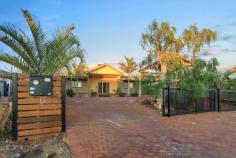  19 Snapper Loop Exmouth WA 6707 $799,000 • 	 5 x 3 home • 	 Expansive wrap around verandah • 	 Covered parking Welcome to 19 Snapper Loop! Enjoy the expansive indoor and outdoor living areas of this top quality 5 x 3 home. Walk through the front doors, into the foyer and gaze toward the winding staircase leading to a private king bedroom with en suite and built in robe. Past the staircase you will find the open plan lounge and dining area with solid jarrah flooring opening onto the covered outdoor verandah's which surround the home. The light filled kitchen boasts fantastic storage, modern finish and room for the whole family. Downstairs there are 4 bedrooms and two bathrooms in separate wings of the house and a separate laundry. All bedrooms have built in robes. The home is finished to a high standard with a ducted vacuum system, 15kw ducted air conditioning and solar hot water system and plenty of storage. There is a high clearance double carport to keep vehicles out of the sun and plenty of space to park vehicles and boats securely off the road. Enjoy the convenience of a garden shed to neatly house your gardening equipment. The home is also fully fenced.  To view this beautiful family home phone exclusive listing agent Victoria Moore on 0447 480 264. 