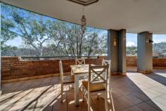  19/10 Hopegood Place Garran ACT 2605 $595,000+ PLEASE NOTE IF NOT SOLD PRIOR, THIS PROPERTY WILL GO TO AUCTION THURSDAY 3RD SEPTEMBER - 2/14 WALES STREET, BELCONNEN AT 2PM With 109 sqm of living space, an extra 45 sqm of balcony space, and only a single step into the building, this apartment is sure to impress. The popularity of these spacious apartments is easy to understand when you enter this meticulously maintained and well built complex. The location is ideal with the Garran shops right next door and the Canberra Hospital and Garran Primary just moments away. But make no mistake, these external benefits are well complemented by the comfortable and airy home inside. With just one step to enter this ground floor apartment you are greeted with a spacious open-plan living and dining area that opens up into one of the largest north-facing balconies in the complex, overlooking the green parkland leading down to the Garran oval. This open living space is north-facing, with the large full-length windows letting in plenty of sunlight and creating a light and airy feel. The kitchen features a marble breakfast bar, and plenty of storage. Off this main living area is a separate laundry with a sink and space for a washer and dryer, as well as a generous main bathroom including a combined bath and shower. Both double bedrooms are carpeted with the second bedroom including a built-in-robe and the north-facing master bedroom featuring access to the balcony, as well as a walk-through robe, and a large ensuite with double vanity. The home has the added bonus of a spacious linen closet, a double lock-up basement garage, a split system air conditioner in the living area and in-slab heating throughout, and plantation shutters to both bedrooms. Combine this prime location with the quality of the home and this apartment is the perfect opportunity for downsizers, first home buyers, professional couples, and investors alike. With beautiful maintained grounds and an enviable proximity to popular local shops, schools, as well as public transport, this home is a unique opportunity you won't want to miss. Features Well maintained complex Ground floor two bedroom apartment with just one step to the entry Large north-facing open-plan living and dining area A large north-facing balcony running the whole length of the apartment Kitchen features marble breakfast bar and ample storage Separate laundry with sink Generous main bathroom with combined bath and shower Secondary bedroom with built in robe North-facing master bedroom , balcony access, plantation shutters, walk-through robe, ensuite with double vanity Linen closet Double lock-up basement garage Split system air conditioning in living area In-slab heating throughout Crimsafe security screen to external doors Plantation shutters in master bedroom Close to local shops, schools, public transport, and Canberra Hospital In the school catchment area from Garran Primary School and Alfred Deakin High School Perfect for first home buyers, professional couples, and investors EER 4.5 stars Built in 2002 Living space approximately 109sqm Balcony approximately 45sqm Rates approximately $1,728 per annum Body Corporate approximately $6,204 per annum FEATURES: • 	 Air Conditioning • 	 Built-In Wardrobes • 	 Close To Schools • 	 Close To Shops • 	 Close To Transport • 	 Secure Parking 