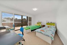  19/10 Hopegood Place Garran ACT 2605 $595,000+ PLEASE NOTE IF NOT SOLD PRIOR, THIS PROPERTY WILL GO TO AUCTION THURSDAY 3RD SEPTEMBER - 2/14 WALES STREET, BELCONNEN AT 2PM With 109 sqm of living space, an extra 45 sqm of balcony space, and only a single step into the building, this apartment is sure to impress. The popularity of these spacious apartments is easy to understand when you enter this meticulously maintained and well built complex. The location is ideal with the Garran shops right next door and the Canberra Hospital and Garran Primary just moments away. But make no mistake, these external benefits are well complemented by the comfortable and airy home inside. With just one step to enter this ground floor apartment you are greeted with a spacious open-plan living and dining area that opens up into one of the largest north-facing balconies in the complex, overlooking the green parkland leading down to the Garran oval. This open living space is north-facing, with the large full-length windows letting in plenty of sunlight and creating a light and airy feel. The kitchen features a marble breakfast bar, and plenty of storage. Off this main living area is a separate laundry with a sink and space for a washer and dryer, as well as a generous main bathroom including a combined bath and shower. Both double bedrooms are carpeted with the second bedroom including a built-in-robe and the north-facing master bedroom featuring access to the balcony, as well as a walk-through robe, and a large ensuite with double vanity. The home has the added bonus of a spacious linen closet, a double lock-up basement garage, a split system air conditioner in the living area and in-slab heating throughout, and plantation shutters to both bedrooms. Combine this prime location with the quality of the home and this apartment is the perfect opportunity for downsizers, first home buyers, professional couples, and investors alike. With beautiful maintained grounds and an enviable proximity to popular local shops, schools, as well as public transport, this home is a unique opportunity you won't want to miss. Features Well maintained complex Ground floor two bedroom apartment with just one step to the entry Large north-facing open-plan living and dining area A large north-facing balcony running the whole length of the apartment Kitchen features marble breakfast bar and ample storage Separate laundry with sink Generous main bathroom with combined bath and shower Secondary bedroom with built in robe North-facing master bedroom , balcony access, plantation shutters, walk-through robe, ensuite with double vanity Linen closet Double lock-up basement garage Split system air conditioning in living area In-slab heating throughout Crimsafe security screen to external doors Plantation shutters in master bedroom Close to local shops, schools, public transport, and Canberra Hospital In the school catchment area from Garran Primary School and Alfred Deakin High School Perfect for first home buyers, professional couples, and investors EER 4.5 stars Built in 2002 Living space approximately 109sqm Balcony approximately 45sqm Rates approximately $1,728 per annum Body Corporate approximately $6,204 per annum FEATURES: • 	 Air Conditioning • 	 Built-In Wardrobes • 	 Close To Schools • 	 Close To Shops • 	 Close To Transport • 	 Secure Parking 