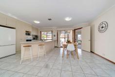  13/5 Taronga Place O'malley ACT 2606 This four bedroom free standing townhouse offers plenty of living space, low maintenance outdoor areas, and a quiet safe complex to raise a family or enjoy your retirement. With features like reverse cycle air conditioning, ducted vacuum system, a DAS security system, and a double lockup garage with internal access, this home effortlessly combines comfort and practicality. As you first enter the home you are greeted with a large, light filled, formal living and dining room looking out onto the manicured front lawn. This room is perfect for entertaining with an adjacent powder room for guests and the ability to close the area off from the rest of the house. The hub of the home however is the open plan kitchen and family room with access to the outdoor spaces. The north facing double glass sliding doors onto the covered patio let in plenty of light and create a seamless blending of the indoors and out. The kitchen benefits from a four burner gas stove, as well as access onto a large partially covered private courtyard, perfect for alfresco dining. The rear wing of the property houses the four double bedrooms all with built-in-robes and garden views. The secondary bedrooms are serviced by a large wet area that includes a main bathroom with a shower and bath, an additional vanity and separate toilet, a large double linen closet, and a separate laundry with external access. The master suite has the added benefit of a spacious walk through robe, an ensuite with a corner spa bath, and a direct door through to the adjoining bedroom; the perfect spot for a nursery or study. The back garden of this home is ideal for young families or those looking for a low maintenance outdoor space. With the perfect mix of paved areas for seating and dining, and flat grass areas for playing and relaxing you can enjoy the benefits of garden oasis without all the hard work. The added bonus of a double lockup garage with internal access, two side gates for direct street access, and a spacious garden shed, this back garden is all you need Rosewood Estate combines all the benefits of suburban living with the community and safety of a tight-knit and highly regarded development. The large freestanding home with private outdoor areas gives you all the privacy you need while enjoying a quiet, family friendly setting in a leafy cul-de-sac of O'Malley. This rare opportunity to purchase a house of this size in such a premier location is one you won't want to miss out on. Features Free standing townhouse in Rosewood Estate Multiple living spaces Low maintenance outdoor areas Quiet and secure complex Reverse cycle air conditioning Ducted vacuum system DAS security system Double lockup garage with internal access Large formal living and dining room Powder room with separate toilet Open plan kitchen and north facing family room with access to outdoor spaces Covered patio off family room Large partially covered courtyard off kitchen Four bedroom home all with built-in-robes Serviced by large wet area including, main bathroom, separate vanity and toilet, separate laundry with external access, large linen closet Master bedroom includes walk through robe, ensuite with spa bath, and direct access to adjoining bedroom; perfect for a study or nursery Back garden is very low maintenance and includes paved patio, flat grass areas, and garden shed Tight-knit townhouse development, quiet leafy cul-de-sac Visitor parking adjacent to the home, as well as street parking on Taronga Place One of the most sought-after suburbs in Canberra Perfect for families or retirement EER 5.5 stars Year built 1997 Living size approx: 206.02sqm Garage approx: 41.43sqm Body corporate fees: $4,082.1pa Rates: $3,823.15pa ** Please note there is limited visitor parking available in Rosewood Estate; when attending the open homes for this property please park in Taronga Place and walk the very short distance to the home Please note this property will go to auction on Thursday, 27th August from 12:00pm. Please visit www.raywhitecanberra.com.au/watch-our-auctions-live FEATURES: • 	 Air Conditioning • 	 Alarm System • 	 Built-In Wardrobes • 	 Close To Transport • 	 Formal Lounge • 	 Garden • 	 Secure Parking.. 