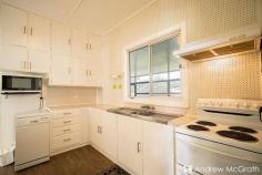  18 Oxley Street Swansea NSW 2281 $590,000 to $630,000 Whether you're hunting for a perfect and potential-packed first home, an easy-to-maintain weekender, or the home-base of a beautiful retirement, 18 Oxley Street has everything you need! This ready to move in to home in Swansea North that's bursting with possibilities - as well as a few surprising extras. Situated on a good-sized level 588 square metre block in the highly desirable Swansea North with a 21 metre wide frontage, with Chapman Oval and Swansea Channel to the street's east, and the shores of Lake Macquarie to the west. With much of the best of Swansea within 5 minute's walk, including Swansea Worker's club, everyday here can feel like a weekend! Modern bathroom, air conditioned living and new floor coverings to the lounge and hall, as well as a massive Queensland room to the rear, this is perfect for those weekend getaways. So what's inside? Let's take a look! - Air Conditioning - Two Garages AND an enclosed carport + garden shed - Solar Panels and Hot Water - Rain Water Tank - Built-in to main bedroom - Ceiling fans throughout - HUGE Queensland room- perfect for lounging and entertaining - Extra WC - Workbenches and ample storage in both garages - BIG back yard! 18 Oxley Street could be a stepping stone to the ultimate midsized family home or the perfect foundation for a budding design lover to create the cottage of their dreams! Don't let this one slip by, get in touch with Andrew or Bec on (02) 4972 1066 or email sales@andrewmcgrathfn.com.au to find out how to make it yours today! KEY FEATURES: Built in RobesDishwasherHot Water ElectricHot Water SolarWorkshopFully FencedRemote GarageShedSplit System (Air Con)Solar PanelsWater Tank 