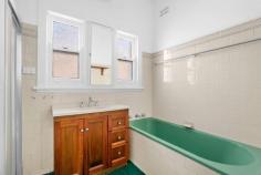  119 Mount Keira Road West Wollongong NSW 2500 $750,000 - $815,000 Endless potential and scope for capital growth presents itself in this charming full-brick cottage - standing proud on the high side of the street opposite Edmund Rice College. An ideal site for a new dual-occupancy development (STCA), the property is equally inspiring for the project-minded buyer with high ceilings, double-hung windows, picture rails and brick mantels showing plenty of retained character. Desirably positioned with transport virtually at the door, this terrific foothills setting also enjoys easy access to Keiraville village, local sporting ovals and Wollongong's hospital precinct. Features: Sweet cottage opportunity facing sunny north-east Three square bedrooms in total plus bonus garden studio Spacious lounge, separate dining and huge eat-in kitchen Neat bathroom tiled floor-to-ceiling with tub plus shower Private fenced yard, under-house and shed storage, carport Superb convenience steps to city/University bus stops *some images may contain digital furniture.. 