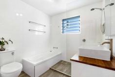  54 Connaught Street Sandgate QLD 4017 $588,850 This charm-filled cottage, circa 1920’s, a traditional Queensland beach-cottage infused with lashings of character, has been tastefully renovated and extended to the highest of standards; presentation, ambience, and location truly shine. The perfect size for a couple of small family, it comprises three bedrooms, two elegant bathrooms, stylish modern kitchen with adjoining dining, formal lounge, north-facing front porch, expansive covered back deck overlooking huge child/pet friendly backyard, and studio. Stunning polished pine floorboards, double hung windows, high ceilings, air-conditioning, ceiling fans, separate bath and shower in main bathroom, floor to ceiling tiles in both bathrooms, bifold timber framed glass stacker doors to deck, VJ feature wall in lounge, stone benches, stainless steel appliances, gas cooktop, gas hot water, garden shed, and studio/storage; are all features of note. Seamlessly blending old-world warmth with contemporary comforts – the overall effect works beautifully; generating timeless appeal that is increasingly sought after in the marketplace and becoming rarer and rarer. Aficionados of this vintage of home will adore this! The garden is fully fenced and easy care, and there is masses of room in the back yard for a trampoline, pool, cubbyhouse, and to park the tinnie…and so close the water, investing in a boat is money well spent. Located within walking distance to local parks, sporting ovals, Sandgate State School, shops, dining, and rail station; plus just a few minutes’ drive to the water, and 30 minutes to Brisbane CBD, an easy commute by train – this is not only a prime lifestyle location, but also close to essential services and amenities. This is super-cute and truly special; first to inspect will want to buy. Do not miss out! Contact us to arrange your very own private inspection today. Open 7 days Phone 07 3203 6001 (24 Hours) WE ARE TAKING ALL CARE AND PRECAUTIONS REQUIRED DURING THIS COVID-19 FLU VIRUS EVENT.. Features we love : • Charming 1920’s style cottage • Tastefully renovated & extended • 3 bedrooms, 2 elegant bathrooms • Modern kitchen with stone benches • Expansive covered rear deck • Polished pine timber floors • Ceiling fans, A/C, gas hot water • Garden shed, studio/storage • Fully fenced easy-care 506m2 block • Huge child & pet friendly backyard • Walk to local amenities incl: rail • Presentation, location, character!! 