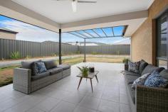  7 Griffiths Road Tangambalanga VIC 3691 $489,000 Nestled in Tangambalanga's most sought-after location, this family home offers a level of character which is sure to impress. With 36.41 squares under roof spread across multiple living zones, this 12-month-old Bridgewood Built home is a class above the rest. Upon entry you are greeted by high ceilings, beautiful timber look flooring and the general feeling of space that flows through the whole home. A formal lounge is perfect for the family movie night or just a quiet space to sit and catch your breath. Comprising of four spacious bedrooms, three offering built in robes, while the over-sized master features an ensuite and walk in robe. Designed with the growing family in mind the main bathroom is thoughtfully positioned at the rear of the home, close to the third living space or kid's zone. Saturated in natural light, the open plan kitchen is brimming with designer touches complete with granite benchtops, high quality appliances and a walk-in pantry offering an abundance of storage options. The living and meals area is just stunning, opening up to the undercover outdoor living space, bringing the outdoors in. Enjoy a glass of wine and take in the view of the surrounding mountains from the rear entertaining area. Living costs are kept to a minimum with the installation of a 5-kilowatt solar system and water tank. Your vehicles and toys are out of the elements in a double lock up garage with remote roller doors and internal access. The double gates offer access to the rear yard which provide extra parking space for a boat or caravan. The perfect mix of indoor and outdoor living, this family home truly is a class above! Call today to arrange your private inspection. 