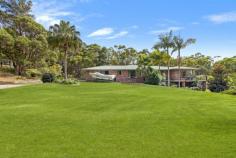  2 Dawson Street Somersby NSW 2250 Nestled on a very quiet, 4.25-acre block about 5 minutes’ drive from the Somersby Industrial Estate and the M1 and approximately 35 minutes to Wahroonga and 10 minutes to Gosford, this expansive & elegant home flows over two levels. The main entry level offers 3 large living areas, beautiful kitchen, 4-bedrooms (main with ensuite & walk-in robe) and an oversized double garage and workshop. The living areas flow out to a wide, wrap around concrete verandah and floor to ceiling windows capture superb forest views. The upper level has high ceilings and combustion fire and split air conditioning for year round comfort. Downstairs is a vast rumpus room complex with adjacent toilet, large laundry and two more separate, multipurpose rooms, all flowing to undercover, outside living/entertaining areas. There are additional useful storage rooms on this lower level. The land is semi-cleared with low maintenance gardens, open lawns and multiple benched areas and tracks through rainforest slopes. A walkway leads down the escarpment to Narara and nearby schools. Features: • 	 Air Conditioning • 	 Balcony • 	 Open Fire Place • 	 Outdoor Entertaining • 	 Rumpus Room • 	 Water Tank. 