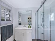  76 Coolawin Circle Narara NSW 2250 This is the home you’ve been waiting for. From the moment you arrive you’ll be impressed by the striking street appeal. Stepping inside this sophisticated single level home there is a distinct ambience of relaxed elegance, accented by an artful blend of warm neutral tones, an abundance of natural light and stunning plantation shutters throughout. The highly functional floorplan offers multiple formal and casual living areas while seamlessly connecting indoor / outdoor living spaces. Looks aside, the location is ideal – set amongst quality homes and within easy walking distance to the very popular St Phillips College & local park. This stunning home will be suitable for an array of buyers and must be seen to be fully appreciated! Features: • Four generously sized bedrooms all with built-in robes + study (5th bedroom) • Master bedroom oversized with ensuite & WIR • Boasting a beautifully appointed modern kitchen with ample cupboard/storage space, stainless steel bosche appliances + gas cooking, oversized bench & breakfast bar sitting simply perfect as the hub of the home for family and friends the gather at ease. • Multiple living zones on offer including formal & casual with your choices of entertaining areas and quiet getaways for all to find their very own space after the busy day. • Fresh light & bright generously sized main bathroom with separate bath & shower • Privacy assured with a fully fenced & landscaped with soft grass rear yard. Perfect for the kids & pets to play all year round (room for a pool if desired stca) • Parking is a breeze with the auto double garage with easy internal access to the home + off street parking for 2 more cars Extras: NBN connected, ducted air throughout, natural gas – heating, cooking, hot water, water tank This location is all about peace, privacy and convenience with easy access to all that the Central Coast has to offer. Perfectly positioned close to shops, schools and public transport, there is also easy access to the M1 motorway, placing Sydney & Newcastle within easy reach for commuters. Within a half hour radius you can also access a selection of beautiful beaches, the shopping mecca of Erina Fair /Tuggerah or the University of Newcastle (Ourimbah campus). For further details or to arrange your inspection call Jodie Walsh on 0424 914 364 