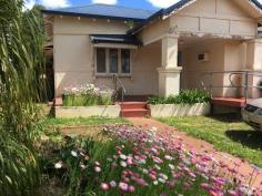  16 Gerald Terrace Northam WA 6401 $220,000 Yes, this home needs lots & lots of work and lots & lots of of TLC,   but, can you bring this 1930's character home back to its former grandeur? This property boasts being in a lovely part of town and that is why I have stressed Location, Location, Location. The home is located on Gerald Terrace but also includes a big back yard with vehicle access from Angus Way off Gordon Street. So what do we find in a 1930's character home? - High ornate ceiling original in the loungeroom and dining room. original leadlight front door and windows throughout, metre wide jarrah window ledges and wallpaper walls. Although the home has retained the yesteryears look, most of the rooms need attention from  replacing ceilings painting re generating the Jarrah floorboards, (some damage) to upgrades to the bathroom kitchen and wall structures. All the rooms are big, from the loungeroom and  dining room to the bedrooms. One of the bedrooms has a two door access and would be ideal to include as a computer/office room,? Step outside to a full length under cover enclosed patio, that opens out to a big yard with vehicle access from Angus Way. I will be conducting Home Opens but for a private viewing please contact Claire 0407 086 156.. 