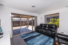  81 Irinyili Street Bonner ACT 2914 $699,000+ ***Although restrictions have lifted please remember COVID-19 guideline rules. Social distancing is to be respected. *** *** You may be asked to remove your shoes upon entry to the open home. We apologise in advance for any inconvenience this may cause and thank you for your co-operation and understanding.** Situated in the sought-after suburb of Bonner is this 4 bedroom ensuite family home. Its easy flow floor plan creates a comfortable, spacious home for the whole family to enjoy. The easy maintenance garden makes a memorable first impression which lasts throughout the whole property. Two separate living areas create a space for mum and dad to enjoy separate to the kids, or an option for a formal living area. The spacious open plan living area off the kitchen is the central hub to this home. The main bedroom is equipped with an ensuite and walk in robe for added convenience. The remaining rooms are spacious in size and have built in robes. Within close proximity to great schools including Neville Bonner Primary School, local shopping centres including Woolworths Bonner, Gungahlin Market Town or the bustling Casey Market Town all just a short drive away. Features 4 spacious bedrooms Built in robes to bedrooms Separate master bedroom with walk in robe and ensuite Large open plan dining and family area Large bathroom with bathtub and separate toilet Separate laundry Ample cupboard and bench space to kitchen Ducted reverse cycle heating/cooling (zoned) Easy maintenance garden Alfresco dining with outdoor kitchen, stone bench tops and gas bayonet Double garage with internal access.. 
