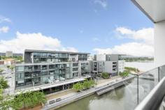  19/11 Trevillian Quay Kingston ACT 2604 $660,000+ Brought to the market by Milin Bros Builders & Developers Amalgamated Property Group, Lakefront on Kingston Island offers unprecedented & exclusive apartments on the shoreline of Canberra's premier waterfront precinct. Perched high on level 6 (Top Floor) & offering a tranquil water outlook from the covered balcony, which flows effortlessly from the living areas, this 73m2 two bedroom apartment has a unique floor plan which the architect has designed to maximize both natural light and panoramic views. The fixtures and fittings throughout the apartment exude extravagance with the Kitchen boasting stone floor tiles, a stone benchtop & Miele appliances including gas cooktop, dishwasher & oven. The bathroom has sleek and sophisticated floor to ceiling marble tiles, whilst the master bedroom features is own private balcony; perfect for the morning cuppa. Situated North of the new Kingston Foreshore Harbour, this apartment has water views of the canal and the East Basin of Lake Burley Griffin; with views to Black Mountain Tower. The Kingston foreshore is highly regarded for its popular bars & restaurants; all of which is right at your doorstep and within minutes of the Parliamentary zone, Kingston, Manuka and the City. Lakefront is close to many employment hubs, retail options and entertainment possibilities. Residents will also enjoy luxury resort-style living, including a stunning lakeside courtyard leading to a fully equipped gym & infinity pool for their exclusive use. EER6 Features overview: • Top level inclusions & fit-out throughout • Two Allocated basement car spaces & a storage enclosure • Lift access direct from the basement car park & foyer to your level • Intercom entry to building & basement for guests • Easterly & northerly vistas towards the lake • A unique floor pan with extensive use of glass to provide a bright, light-filled residence • Ducted heating & cooling • Kitchen with stone floor-tiles, stone benchtop & Miele gas cooktop, dishwasher & oven • Bathroom with stone top vanity and floor to ceiling wall tiles • On site, fully equipped gym & infinity edge swimming pool directly overlooking Lake Burley Griffin • This is a pet-friendly development (subject to body corporate notification) 