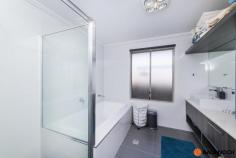  81 Irinyili Street Bonner ACT 2914 $699,000+ ***Although restrictions have lifted please remember COVID-19 guideline rules. Social distancing is to be respected. *** *** You may be asked to remove your shoes upon entry to the open home. We apologise in advance for any inconvenience this may cause and thank you for your co-operation and understanding.** Situated in the sought-after suburb of Bonner is this 4 bedroom ensuite family home. Its easy flow floor plan creates a comfortable, spacious home for the whole family to enjoy. The easy maintenance garden makes a memorable first impression which lasts throughout the whole property. Two separate living areas create a space for mum and dad to enjoy separate to the kids, or an option for a formal living area. The spacious open plan living area off the kitchen is the central hub to this home. The main bedroom is equipped with an ensuite and walk in robe for added convenience. The remaining rooms are spacious in size and have built in robes. Within close proximity to great schools including Neville Bonner Primary School, local shopping centres including Woolworths Bonner, Gungahlin Market Town or the bustling Casey Market Town all just a short drive away. Features 4 spacious bedrooms Built in robes to bedrooms Separate master bedroom with walk in robe and ensuite Large open plan dining and family area Large bathroom with bathtub and separate toilet Separate laundry Ample cupboard and bench space to kitchen Ducted reverse cycle heating/cooling (zoned) Easy maintenance garden Alfresco dining with outdoor kitchen, stone bench tops and gas bayonet Double garage with internal access.. 