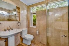  2 Nicholas Ave Bundanoon NSW 2578 $1,050,000 This gorgeous character double brick residence set amongst a stunning old established cottage garden will win over even the most discerning of buyers. Showcasing all the traditional features one would expect in a home of this vintage from the tiled entry porch to the back door and gardens beyond. 10ft ceilings, timber floor boards, large skirtings, fret work, picture rails, highlight shelving, stained glass windows, stained glass cabinetry throughout and window seats in the two main bedrooms plus open fire place to one Freshly painted and lacquered floorboards throughout most of the home Master bedroom has extensive built in robes and modern ensuite with underfloor heating and highlight windows Two bedrooms can be configured many ways with one having a utilities room perfect as a home office, sitting room or child’s play room whilst the 4th bedroom accesses the rear deck and would make an excellent work from home space Main bathroom is both quirky and charming with timer panelling, stained glass features and sky light Generous dining room (or second lounge) with open fire place and servery to the centrally located kitchen Country kitchen offers space for a small table or island bench and offers a 900ml ilve stainless stove and oven built into the chimney space plus a walk in pantry and skylight Casual living space warmed by a s/c wood fire at the rear of the home is bathed in northern sunshine and accesses the timber entertaining deck and magnificent garden beyond Excellent thermal qualities due to double brick construction plus gas ducted heating, multiple fire places and gas points throughout Ample storage given the age of the home with a double linen cupboard, built in cabinetry throughout and huge laundry / mud room with 3rd wc Set behind a sandstone and iron fence the gardens are a special feature of this property, ensuring privacy and a green outlook from every room. The garden offers a series of well organised hedges, garden beds set around old established trees, colourful shrubs and stone walkways. The charming gazebo or artist studio space is a focal point of the rear garden. There are two well positioned garden sheds plus a double gate and gravelled parking bay within the fence line. Within walking distance to the village and a cul-de-sac location, this old gem won’t sit long waiting for its new owner. 