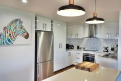  16 Senator Court Newnham TAS 7248 $595,000 Large open plan living, comprising semi-formal dining and family area that overlooks the garden and under cover alfresco area. Stunning kitchen with Westinghouse hot plates and under bench oven plus Elba dishwasher and stainless range hood, along with copious amounts of cupboards with soft close, not to mention ample refrigerator space and adjoining pantry. Daikin reverse cycle air conditioning provides climate control, along with dual blinds installed offering shaded privacy for the summer months or total block out if desired. Lounge has plenty of options for your wide screen media centre and sound system, multiple windows providing light and airflow. Main bedroom has views of the garden, large walk in robe and ensuite featuring double vanity, shower and toilet. Bedrooms two and three have built-ins, bathroom has shower, bath and vanity. Internal access to the double remote controlled garage that also has additional loft storage for those rarely used items. The easily maintained garden has a fully fenced child safe back yard as well as being very pet friendly. Close to the Tasmanian University, Australian Maritime College, Tas Tafe, East Tamar Primary School and Mowbray Heights Primary School. Exclusive agents – Inspections by appointment. 