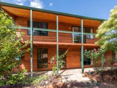  51 Hampstead Hills Drive Gidgegannup WA 6083 $575,000 Give your family the space and freedom of life on 5-acres of mixed pasture and bushland within walking distance of the local school and town centre. This property includes a 4 bedroom, 2 bathroom, 2-storey character home that offers a choice of living zones, plus timber lined outdoor entertaining, a pool and cabana big workshop and double garage. • 	 4 bedrooms 2 bathrooms • 	 2-storey cedar and iron • 	 Choice multi living spaces • 	 Open plan kitchen/meals • 	 Timber-lined alfresco ent • 	 Decked pool and cabana • 	 Double garage w storage • 	 Large powered workshop • 	 5 acres adjoins pony club • 	 Walk town school reserve With its classic country looks, a 5-acre block that blends, fruit trees, ponds and natural bushland and a large powered workshop, this 2-storey rural home, located at the edge of the Gidgegannup township, features a flexible design created to ring with the sounds of family life. The large green canopy of a tall tree at the centre of a circular driveway offers a shady welcome as you step through the front door and into the first of three living spaces – a formal lounge with exposed beams, a slow combustion fireplace and reverse cycle air conditioning. In addition to individual reverse cycle units, the home is fitted with ducted evaporative cooling and ceiling fans. Adjoining the lounge is a bright, modern kitchen and meals area. The kitchen features a 900 mm oven, white, hi-gloss cabinets and timber benchtop with integrated breakfast bar. French doors lead from the kitchen/meals area to a formal dining room which in turn opens to a good-sized family/games room. The central living space extends to the timber-lined entertaining area at the rear of the home. Overhead fans, a lilypond and views to the pool give this outdoor space a delightfully relaxing air. Two junior bedrooms, a family bathroom, separate W.C. and a walk-through laundry complete the first-floor layout. A timber staircase, with built-in storage, leads to a central, carpeted living room with a balcony and two bedrooms. The main bedroom is fitted with reverse cycle air-conditioning and features a spacious walk-through wardrobe and ensuite with shower, vanity and W.C. Dotted across the 5-acre lot is a variety of fruit trees – pear, apple, avocado, mango and citrus – assisted by a greywater system . A shade house gives those with a green thumb space to follow their passion. Towards the front of the property is a large, powered workshop with a concrete floor and small lined partition. A double garage with a separate storage room sits under home’s main roof. This country property adjoins the local pony club and showgrounds. It is within walking distance from the centre of Gidgegannup where a medical centre, post office, primary school and much-loved bakery form a welcoming Hills township. To arrange an inspection of this property or for friendly and honest assistance with any of your real estate needs, call Mr Happy – Ross Webster – 0407 387 004. 