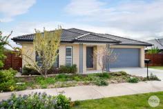  3 Hillman Grove LUCAS VIC 3350 $550,000 This stylish Porter Davis family home of approx. four years has been designed with contemporary family living in mind. Located in Lucas, this expansive home takes every family member lifestyle into consideration with a central hub incorporating the stunning cobalt blue kitchen with Caesarstone benches, stainless-steel appliances and walk in pantry, along with a large combined family/dining area. Large glass doors open onto the alfresco outdoors, while two further living zones can be zoned to the kids and one for the night-time relaxation. This well-crafted floorplan also boasts a sun filled master complete with a double vanity ensuite and walk in robe along with three further bedrooms served by a chic family bathroom, separate toilet, and independent laundry with outdoor access. If energy efficiency is important, you'll be pleased to know this property boasts 6.6kw solar power. Outdoors boasts lush vegetable gardens, open lawns, a double auto garage attached to the home, plus side gates to secure a caravan or boat, or just enter the rear yard with an extra vehicle or trailer. Sitting on a good size allotment of approx. 697sqm, this home also provides walking distance to the primary school and parkland and is just a short drive to the Lucas shopping complex. 