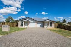  2 Templeton Court WESTBROOK QLD 4350 $550,000 This one of a kind Duplex in a brand new estate has the following features:- Each Unit offers: - Generous open plan living & dining area with lots of natural lighting - Laminex Kitchen with Good Storage, Electric Cooking & Dishwasher - Air Conditioning to Living - 3x Great sized carpeted bedrooms - main bedroom with walk in robe & ensuite bathroom - Spacious main bathroom with bath tub & shower - Single Lock Up Automatic Garage - Grassed yard which is fenced - very big - Close to parks, shops, tavern & schools.. 