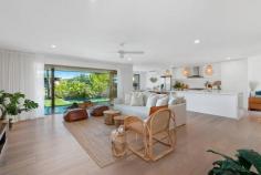  3 Marlin Court PALM BEACH QLD 4221 $1,700,000 This boutique waterfront home has been fully renovated to create a relaxed, modern coastal ambience utilising stylish high end fixtures and fittings with a combination of colours and textures that combine to delight the senses. The design of the home maximises the indoor/outdoor waterfront living environment with the kitchen and open plan living areas flowing seamlessly to the covered outdoor entertaining area and pool through timber bi-fold doors. Features include:- • Facing north to the water with your own sandy beach and direct ocean access; • Gourmet kitchen with 50mm stone tops, 2-pac cabinetry and custom black butt breakfast bar; • Master bedroom suite with timber bi-fold doors opening to capture the water views: • Finishes in the master suite include solid timber joinery and custom vanity, concrete bath and basins; • Main bathroom also with designer bath and basins and blackbutt vanity; • Grey wash oak flooring throughout to enhance the coastal feel; • Fully tiled Inground pool using Indonesian Sukabumi natural tiles; • Spotted gum timber decking to the entry and also alfresco area; • Floating pontoon with rollers for easy boating access; • Air conditioning, 6.6kw solar power; • Electric gate allowing additional secure, off street parking. This recently completed home is in an excellent location offering one of the closest waterfront positions to the beach and associated facilities in the area offering a great lifestyle location where you can literally walk to the beach, cafes and restaurants when you are not at home enjoying your own aquatic playground.. 