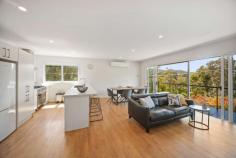  2 Grandview Drive Goughs Bay VIC 3723 $595,000 Summer is just around the corner so now is the time to secure and enjoy a fully renovated home on a well positioned, elevated corner block with 2 titles. Potential to sell the additional title off or just take advantage of the extra space. Boasting an open plan living and dining space upstairs, master bedroom, new bathroom, functional light filled kitchen with caesar stone bench tops, gas stove/oven flowing onto the deck which naturally incorporates the lake views! Down stairs is ready for the family with 2 bedrooms, the 3rd bedroom sleeping 8 or more! Downstairs has another modern living space plus additional bathroom and convenient separate access. And we are not done....this gorgeous home also offers additional storage, room for a boat and over 50,000L of water storage, plus a bore. Jam packed full of value for a permanent home owner, investor requiring solid airbnb potential or a weekend escape. Note there is a "walk in walk out" option. Conveniently close to the Goughs Bay General Store and just 20 minutes from Mansfield. Don't wait with this one! Private inspections only. FEATURES: • 	 Air Conditioning • 	 Built-In Wardrobes • 	 Fireplace(S) • 	 Secure Parking.. 