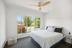  2 Grandview Drive Goughs Bay VIC 3723 $595,000 Summer is just around the corner so now is the time to secure and enjoy a fully renovated home on a well positioned, elevated corner block with 2 titles. Potential to sell the additional title off or just take advantage of the extra space. Boasting an open plan living and dining space upstairs, master bedroom, new bathroom, functional light filled kitchen with caesar stone bench tops, gas stove/oven flowing onto the deck which naturally incorporates the lake views! Down stairs is ready for the family with 2 bedrooms, the 3rd bedroom sleeping 8 or more! Downstairs has another modern living space plus additional bathroom and convenient separate access. And we are not done....this gorgeous home also offers additional storage, room for a boat and over 50,000L of water storage, plus a bore. Jam packed full of value for a permanent home owner, investor requiring solid airbnb potential or a weekend escape. Note there is a "walk in walk out" option. Conveniently close to the Goughs Bay General Store and just 20 minutes from Mansfield. Don't wait with this one! Private inspections only. FEATURES: • 	 Air Conditioning • 	 Built-In Wardrobes • 	 Fireplace(S) • 	 Secure Parking.. 