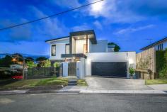  1/25 Waratah Avenue BIGGERA WATERS QLD 4216 $895,000 Extensive thought in design and detail with no expense spared has created this absolute quality modern luxury lifestyle villa which is like a house with its own separate gated entrance and driveway!!! Features include:- - 3/4 bedrooms + upstairs study nook - Master with luxury ensuite & large walk in robe - Bedrooms 2 & 3 are ensuited via a 2-way bathroom - Stylish designer kitchen with walk in pantry & breakfast bar - Spacious fully tiled open plan living areas - North facing fully encloseable outdoor entertaining deck area - Featured timber staircase - Timber floors throughout upstairs. - Fully ducted reverse cycle air conditioning - Fully fenced corner block, intercom, security alarm & auto double lock up garage. Only 2 years old with all the extras added, nothing to spend just move on in...!!!! 