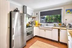  7 Ross St Bundanoon NSW 2578 $895,000 Fabulous 3 bedroom home with a pretty garden vista from every room and deep verandahs accessed via French doors offering an ease of living and making the most of the elevated green outlook. Renovated country kitchen offers timber benches, butlers sink and 900mm stainless freestanding oven/cook top; Fully renovated family bathroom with a second separate wc and spacious laundry with storage and bench space; Open plan living offers gas heating and flows directly off the kitchen and out to the verandah, a major selling point of this property; Outdoor BBQ area to the north and privately screened from neighbours; Excellent storage throughout, with all bedrooms having built-ins plus 3 bay linen cupboard in the hall and exceptional under house storage and shedding; Double garage at the rear could easily be used for garaging vehicles with side access available alternatively there is plenty of off street parking in the front parking bays. A home full of surprises with various garden rooms and year round colour guaranteed, from the various maples, Jacaranda tree, shrubbery and garden beds. There is a raised vegetable garden to the rear plus a 5 star chook shed and under house water tank. All town services available to this painted brick cottage and a healthy walk to the village centre. 