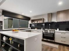  35 Kareen Court Mansfield VIC 3722 $970,000 • 	 Luxurious North facing brick home set on generous 5963m2 (1.5 acres) allotment • 	 Opportunity to further subdivide the land STCA once covenant lifts Dec 2020 • 	 Huge shed with 3 phase power, fully-lined roof, 3 roller doors & open end bay • 	 The magnificent kitchen is the heart of the home with quality stainless steel appliances • 	 Expansive open plan living & dining area flows seamlessly out to undercover alfresco • 	 Lavish parent's wing includes a huge master suite plus a separate sitting/TV area • 	 At the opposite end of the home 3 additional bedrooms all with robing • 	 Spacious main bathroom with shower & bath with separate toilet • 	 Keep comfortable all year round with ducted heating & cooling throughout • 	 Sit back & enjoy the ambience of the crackling wood heater in the cooler months • 	 Laundry with walk in linen/storeroom & concrete pathway to clothesline • 	 Energy efficient with double glazed windows, solar HW, north facing & good insulation • 	 Remote control double garage with direct internal access into the house • 	 Established nectarine, apple, fig, lemon, olive, plum, peach & cherry trees • 	 Fantastic position in a quiet court, minutes to High Street with all town services.. 