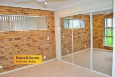  2/157 GREGORY STREET SOUTH WEST ROCKS NSW 2431 $439,000 If you are looking for a low maintenance quality three bedroom townhouse that needs absolutely no money spent on it then this property is available for your inspection now. Open style living area that opens out on to a large balcony with commanding views to the Golf Course and Smoky Mountain. Timber flooring throughout, modern kitchen, brand new main bathroom, semi ensuite in the main bedroom plus full length wardrobe. The double garage enjoys remote roller door access plus huge separate workshop / storage area. Fully fenced side and rear yard. This property has enjoyed an excellent rental occupancy for the past 20 years, however in its present condition would certainly be a superb home to call your own. 