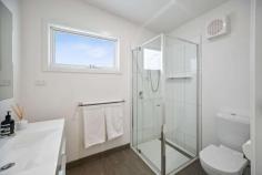  2 Grandview Drive Goughs Bay VIC 3723 $595,000 Summer is just around the corner so now is the time to secure and enjoy a fully renovated home on a well positioned, elevated corner block with 2 titles. Potential to sell the additional title off or just take advantage of the extra space. Boasting an open plan living and dining space upstairs, master bedroom, new bathroom, functional light filled kitchen with caesar stone bench tops, gas stove/oven flowing onto the deck which naturally incorporates the lake views! Down stairs is ready for the family with 2 bedrooms, the 3rd bedroom sleeping 8 or more! Downstairs has another modern living space plus additional bathroom and convenient separate access. And we are not done....this gorgeous home also offers additional storage, room for a boat and over 50,000L of water storage, plus a bore. Jam packed full of value for a permanent home owner, investor requiring solid airbnb potential or a weekend escape. Note there is a "walk in walk out" option. Conveniently close to the Goughs Bay General Store and just 20 minutes from Mansfield. Don't wait with this one! Private inspections only. FEATURES: • 	 Air Conditioning • 	 Built-In Wardrobes • 	 Fireplace(S) • 	 Secure Parking.. 