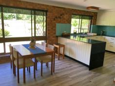  214 Caves Rd Stanthorpe QLD 4380 $697,000 214 Caves Road Stanthorpe one of the most sought after locations on the Granite Belt. This lovely property lends itself to a host of uses and has Development approvals in place. Set on 4.83 hectares this private rural setting has approximately 270m frontage to Funkers Gap Creek with an irrigation licence to service the gardens and surrounds. Homestead and cottage comprises 6 bedrooms plus 3 bathrooms plus lots more. Plus approval for another dwelling. Comprising a tastefully renovated 4 bedroom home with formal living granite rock lined fire place along with separate every day living area also positioned to capture the winter sun this area also includes a wood fired heater. All new and modern kitchen with full size dining area. Kitchen has an abundance of storage and includes all modern appliances. One of the best spaces in this home is the office located just off the kitchen it has a stunning Northerly aspect with plenty of window space available to enjoy the outside from inside. Heating is supplied from an Open fire place along with a wood fired heater. Both bathrooms have been fully renovated and are very presentable. Reverse cycle air conditioning is located in main bedroom and living room. 2 electric hot water systems service the main house and are connected to Solar.  A self contained detached Cottage / Granny flat comprises 1 bedroom plus an Office/second bedroom plus open plan kitchen dining and living along with bathroom. At present the cottage is rented for $250.00 per week A conference room with kitchenette which seats 30 people is located just to the South of dwellings. Solar power is attached to the dwelling comprising 24 panels and a 8.2kw invertor. Water is a feature with town water connection plus approximately 77,000 litre rain water tank supply. A new irrigation pump and pump shed are located by the creek and supply ample garden water. With Potential for a Substantial income this property comes with a Development Approval for: 1. Tourist Park 2. Educational Establishment 3. Short term accomodation Including: 5 self contained cabins for tourists, amenities block, 10 camping sites for students, large conference/activities centre, commercial kitchen, 2 composting toilets, container storage. The best way to appreciate this property is to come and inspect priced at $697,000 contact David Schnitzerling today on 0418717979.. 
