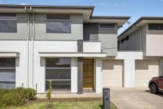  42 McBeath Street Hectorville SA 5073 $490k-$510k Completed in 2016, this Torrens titled custom home by Eastern Building Group offers two spacious levels, three bedrooms and three living areas for the modern family. Enjoying frontage onto McBeath Street among other quality homes, enter into the first downstairs living space between 2.7m ceilings and easy-care porcelain tiles to find an airy bright home. Facing the front of the home, a carpeted lounge enjoys wonderful natural light, while travelling down the hall, emerge in the open plan living and take in all the wonderful space, allowing you to configure your dining and lounge as you wish! Under LED downlighting, the kitchen offers contrast cabinetry and a sleek island bar, while stainless steel appliances include a dishwasher and gas cooktop for ultimate convenience. Upstairs to the carpeted sleeping quarters, find two bedrooms with built-in robes, separated from the main bedroom by a generous bathroom and third family room – meaning each bedroom gets their own living space to relax. The main bathroom offers a large shower and bath tub, while the master suite is complete with walk-in robe and ensuite bathroom. Surrounded by private good neighbour fencing, landscaping is easy care to the front and rear, with just enough lawn to satisfy pets and four-legged family members. Opening up glass sliding doors to the backyard, there’s plenty of room to extend and create an undercover dining area – or just kick back and enjoy dining Alfresco. It’s as effortless as it should be. Moments from Denis Morrissey Park, Campbelltown Library, public transport and local shopping, while just 6.5km to the city, everything you need is right here in Hectorville. Don’t miss: – The lounge downstairs can be easily converted into a bedroom or multi function entertaining area. – Super easy access to shopping centers: apart from the walking distance to Foodland and grocery store on St Bernard Rd, 5 mins drive to Newton shopping center with Woolies and Coles, 5 mins drive to Coles/Kmart Firle shopping center, 4 mins drive to Drakes Newton – Reverse cycle ducted air-conditioning – Guests’ powder room and generous laundry – Secure garage with auto panel lift door – Fully insulated internal & external walls – Exposed aggregate driveways and perimeter paths – Stroll to Romeo’s Foodland and public transport on Saint Bernards Road – Walking distance to East Torrens Primary and zoned to Norwood Morialta Middle and Senior Schools – Easy commute to the Adelaide CBD down Montacute and Payneham Roads.. 