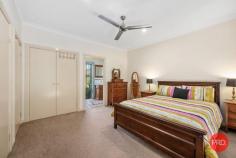  24 Loaders Ln Coffs Harbour NSW 2450 $899,000 - $949,000 Set on just over 2500m2 this private and spacious home is sure to impress. Only minutes from the CBD of Coffs Harbour, this is a rare find in the current market and will certainly appeal to a large range of buyers. The home itself is very spacious and includes multiple living zones and large bedrooms. The main bathroom has recently been renovated and is finished with floor to ceiling tiles and quality fixtures and fittings. The kitchen is original but in very good condition and comes with solid granite benchtops and modern appliances. The functional floor plan has been designed with the family in mind and one end of the house is great for kids or guests and can be closed off from the rest of the house and made fully self contained. The master bedroom with ensuite is privately tucked away at the opposite end of the house and looks over the private rear lawn and gardens. For the entertainer this home is perfect with a huge living area that can be opened up on both sides with a sparkling inground pool on one side and the beautiful greenery of the park like gardens on the other side. For those craving space and privacy this home has got the lot with a mostly level rear yard leading down to the picturesque creek as your rear boundary. Extra vehicles are also well catered for with a 4 bay lock up shed, carport for a large caravan or boat, plus another double carport in front of the house and there is also side access to the rear yard. This is a once in a lifetime opportunity to secure a large house on a large parcel of land in such a convenient location. Don't hesitate as this one will not last long! 