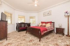  45 Leachs Road Red Cliffs VIC 3496 $450,000-$495,000 Country-inspired manor living awaits the lucky new owners of this grand and elegant home. Set on a 3,212sqm block, there is a lush outlook on offer from every window as well as plenty of land for you to indulge your love of farming and gardening. The expansive floorplan offers three bedrooms, two bathrooms and multiple living spaces making this an idyllic family home. A gas log fire warms the oversized formal lounge with ornate cornices, a pendant light above the dining area and stained glass entrance doors. A quality kitchen services the home and is open to the air-conditioned family room and meals area. There is a large covered alfresco outside where you can relax and take in views over the gardens. An automatic sprinkler system, a beautiful citrus orchard, a 3kW solar system, 7.5m x 12m workshop and 3 megs of water are just some of the extra features on offer. This is a chance to enjoy space and privacy while still being close to all the amenities you need including shops and schools. 